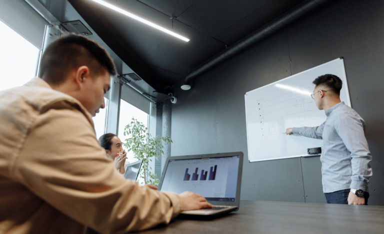 People using data to make decisions in a meeting